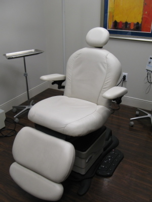 Room D111 Derm Procedure; Midmark 641-003 Electric Positional Exam Chair - White Leather