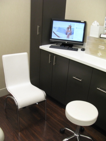 Room C108; Computer/Monitor HP, White Leather side chair, stool on wheels, wall art