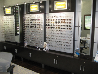 Lighted wall cases and display cases - NOTE IN PHOTO: We are only selling the wall and display cases--EYEWARE IS NOT INCLUDED. - 2