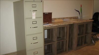 Lot--4 drawer metal file cabinet and 2-4 hole cubby units with formica counter *** PLEASE NOTE: This lot is offered subject to bulk bid offer on lot 118